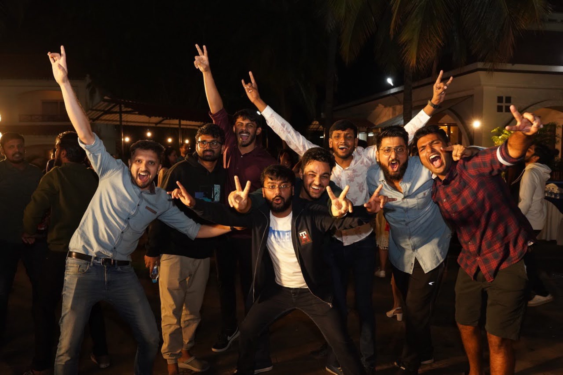 The DigiStay team celebrating together at an offsite.